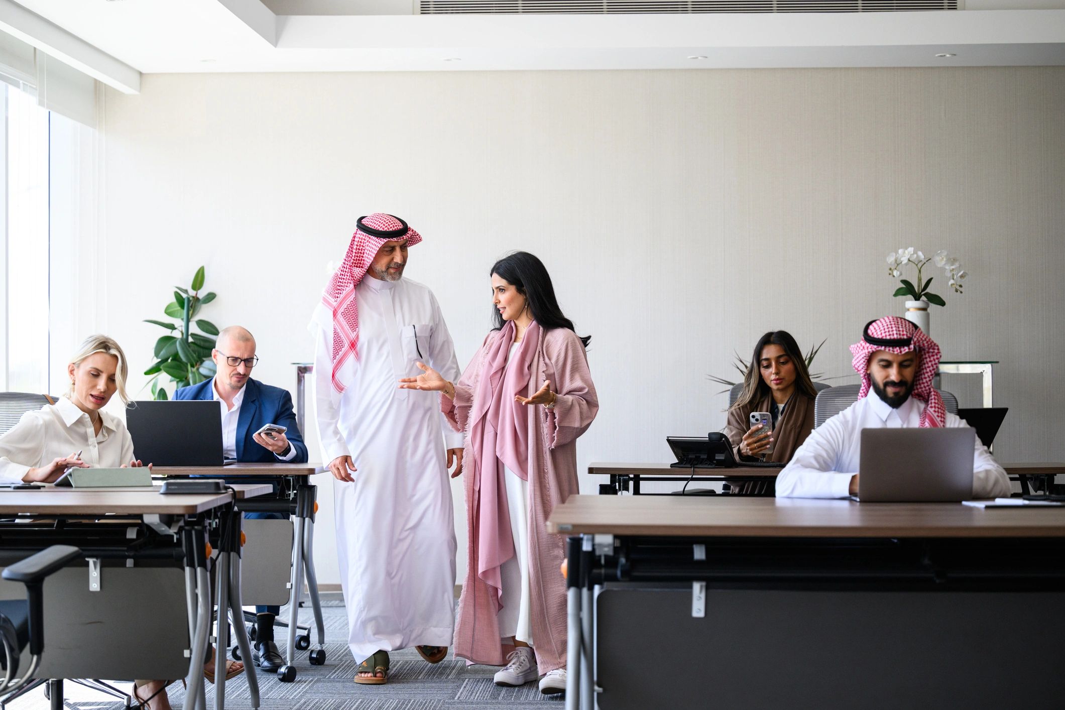 International business team collaborating in a modern office